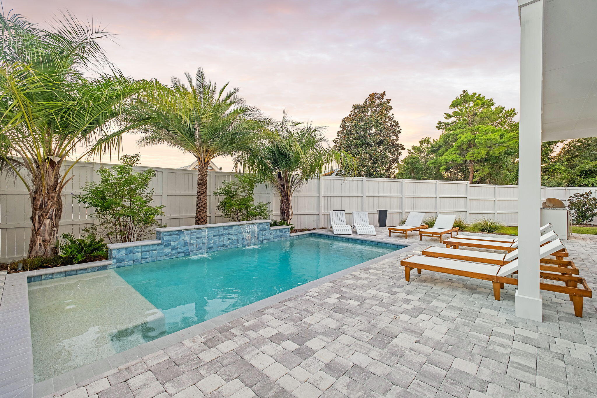 7570 East County Highway 30A Watersound, FL 32461 - Photo 18 of 64 a view of swimming pool with a patio