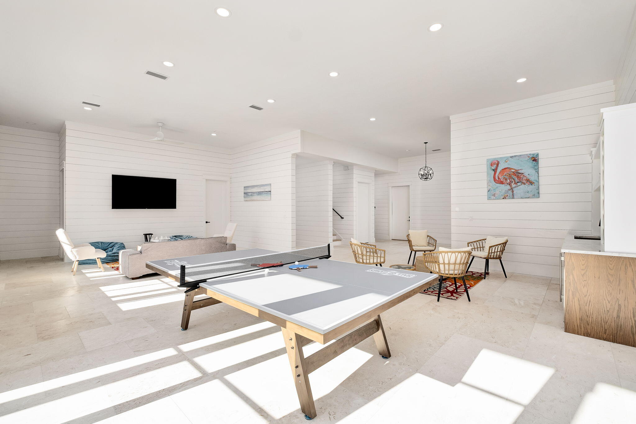 7570 East County Highway 30A Watersound, FL 32461 - Photo 20 of 64 a living room with furniture and a flat screen tv