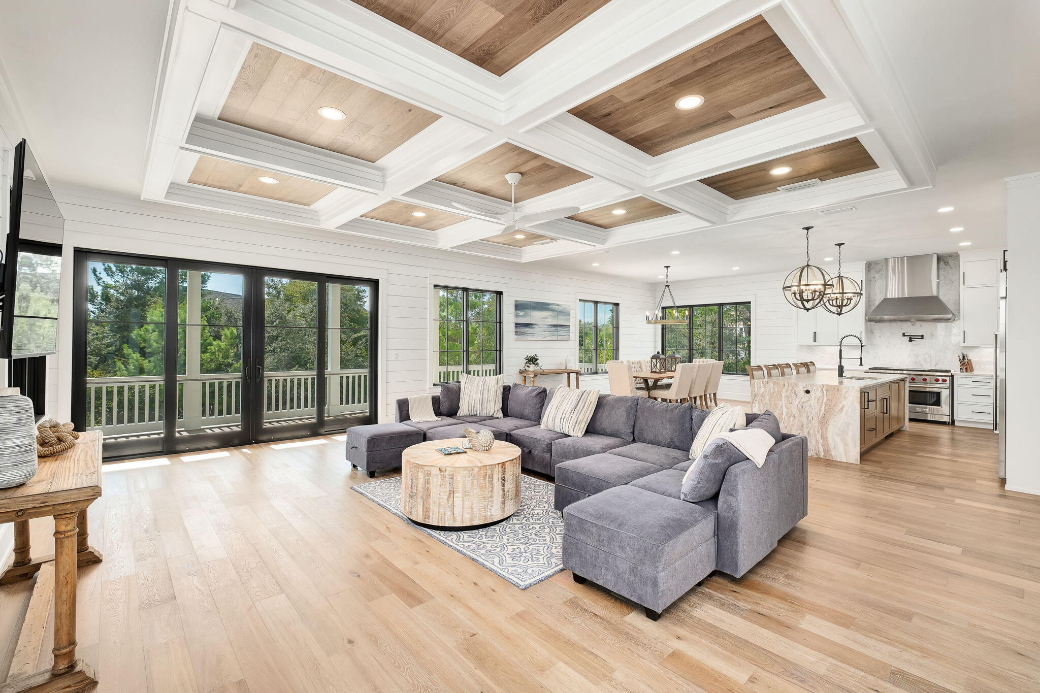 7570 East County Highway 30A Watersound, FL 32461 - Photo 24 of 64 a living room with furniture and a large window