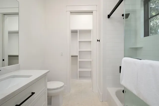 a view of gallery with wooden floor