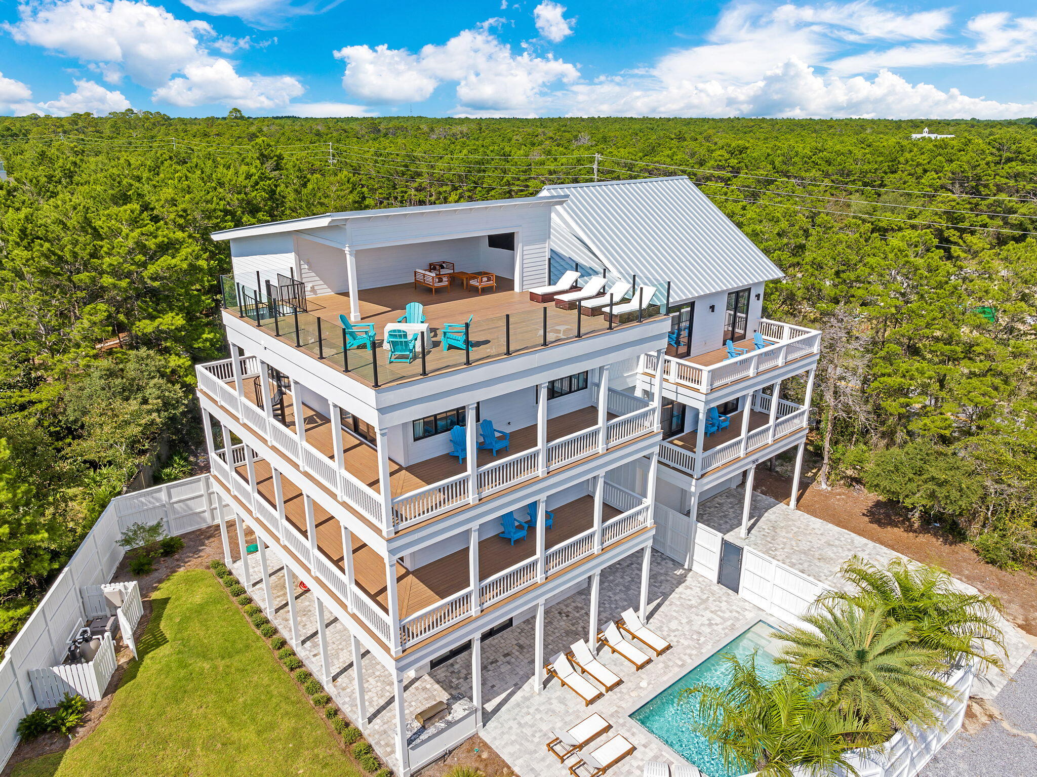 7570 East County Highway 30A Watersound, FL 32461 - Photo 4 of 64 aerial view of a house with a yard