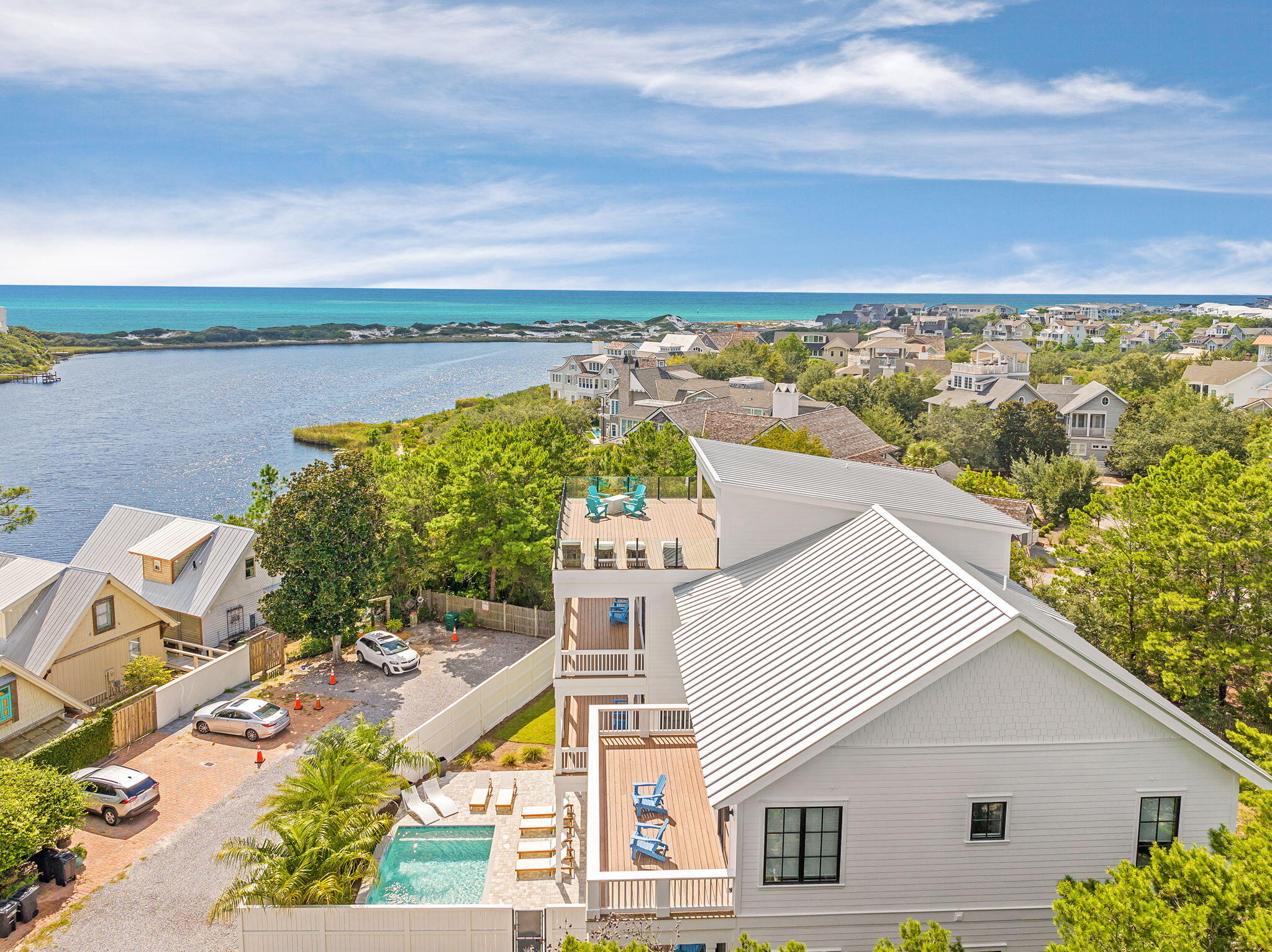 7570 East County Highway 30A Watersound, FL 32461 - Photo 60 of 64 an aerial view of a house with a lake view