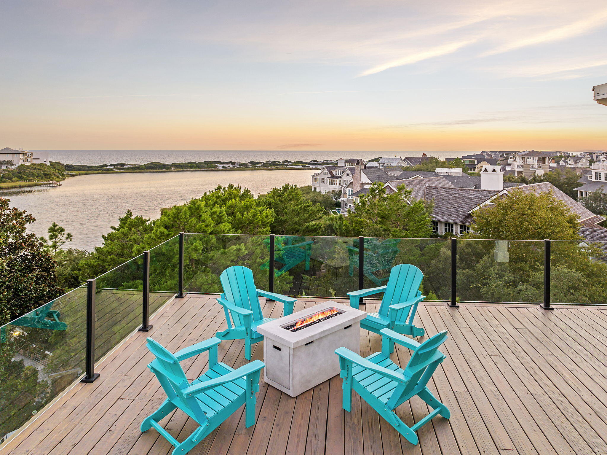 7570 East County Highway 30A Watersound, FL 32461 - Photo 8 of 64 a view of a balcony with two chairs and a table