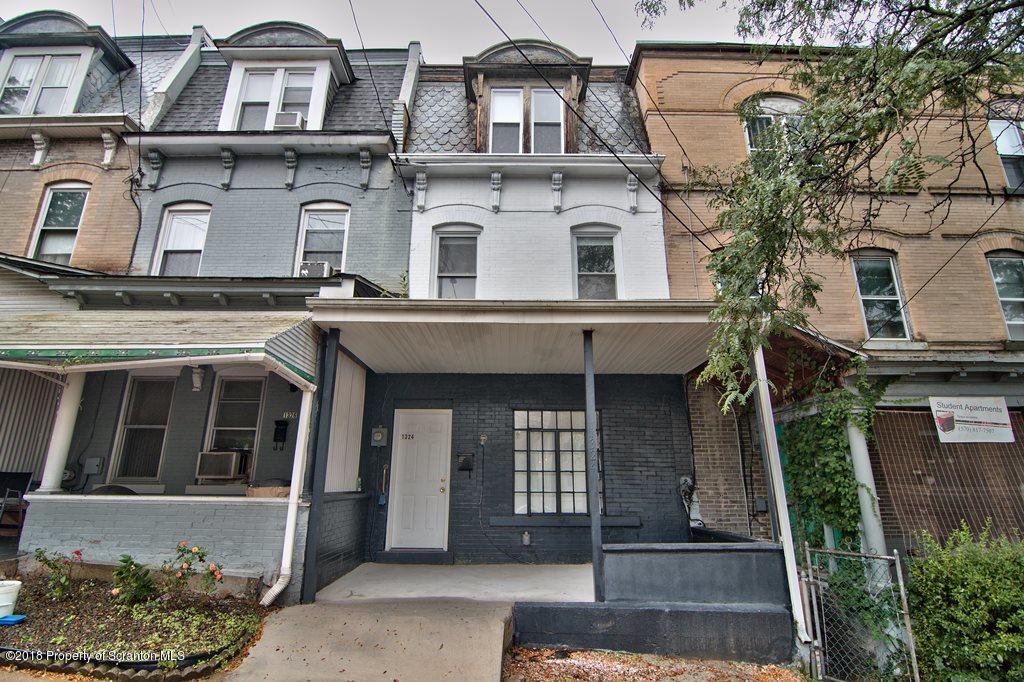 1324 Linden Street Scranton, PA 18510 - Photo 1 of 28 a front view of a house with a balcony
