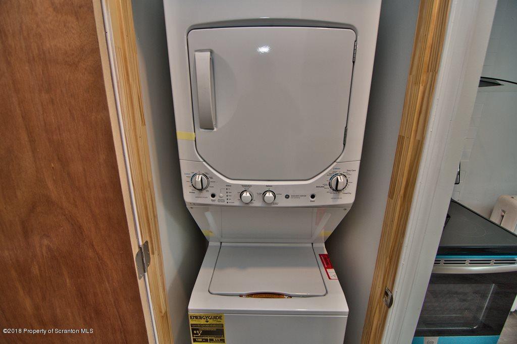 1324 Linden Street Scranton, PA 18510 - Photo 11 of 28 a bathroom with mirror toilet and a sink