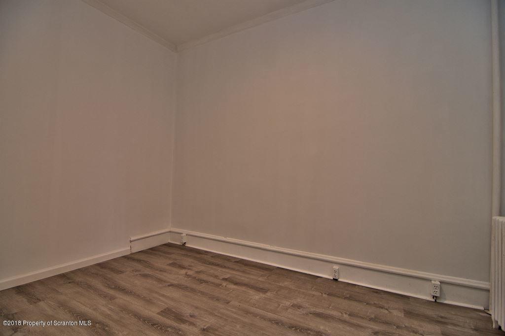 1324 Linden Street Scranton, PA 18510 - Photo 12 of 28 a view of an empty room with wooden floor