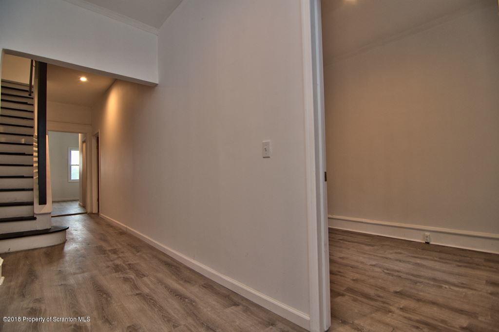 1324 Linden Street Scranton, PA 18510 - Photo 2 of 28 a view of a hallway with wooden floor