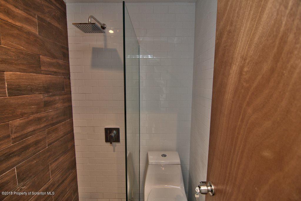 1324 Linden Street Scranton, PA 18510 - Photo 21 of 28 a bathroom with a shower and toilet