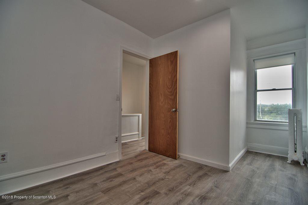 1324 Linden Street Scranton, PA 18510 - Photo 25 of 28 a view of an empty room with closet and a window