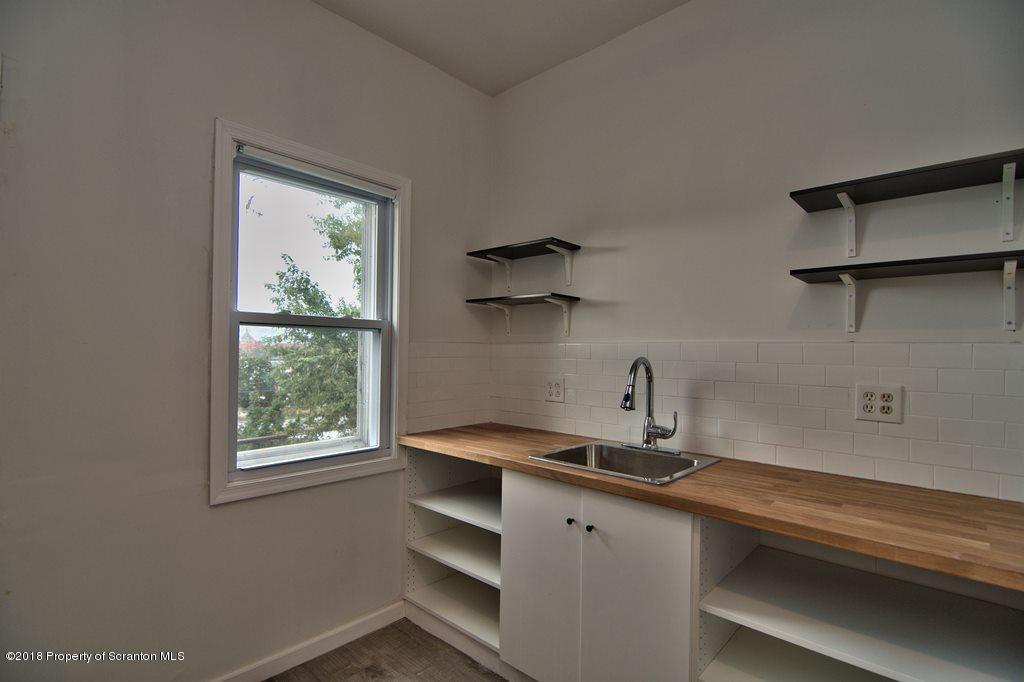 1324 Linden Street Scranton, PA 18510 - Photo 27 of 28 a kitchen with a sink and a window