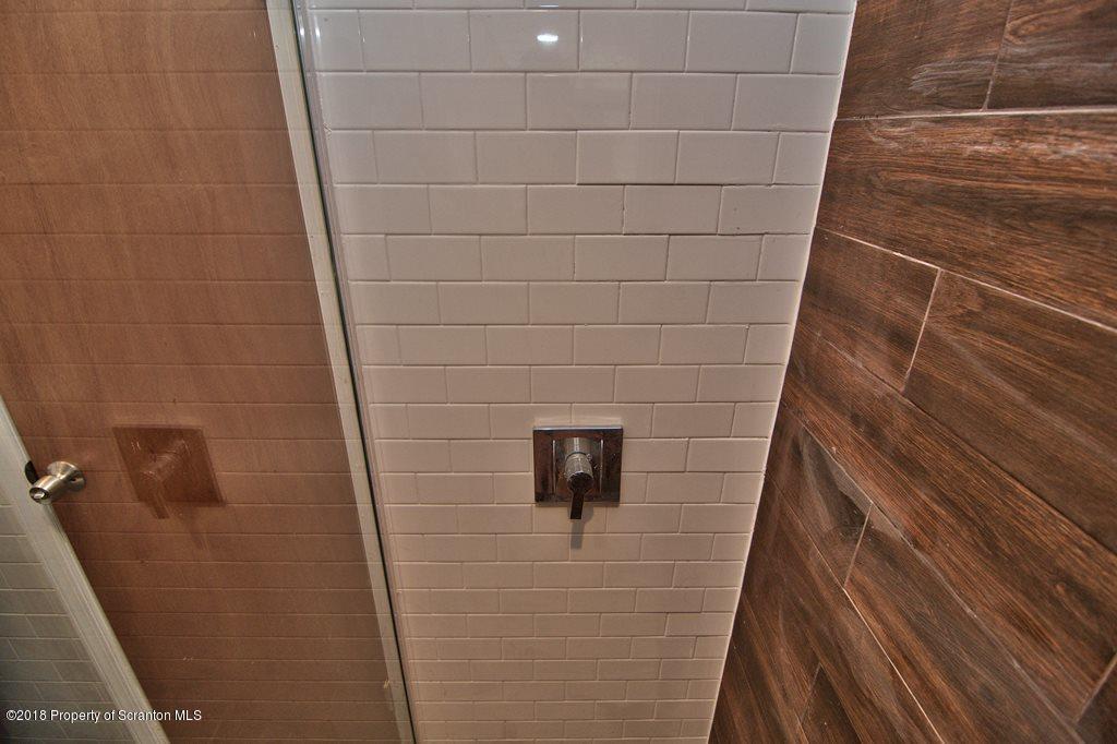 1324 Linden Street Scranton, PA 18510 - Photo 9 of 28 a bathroom with a shower