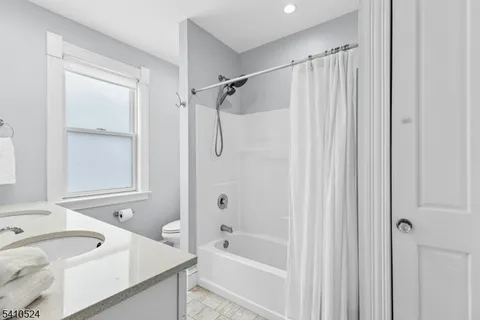 a room with pool table and a table