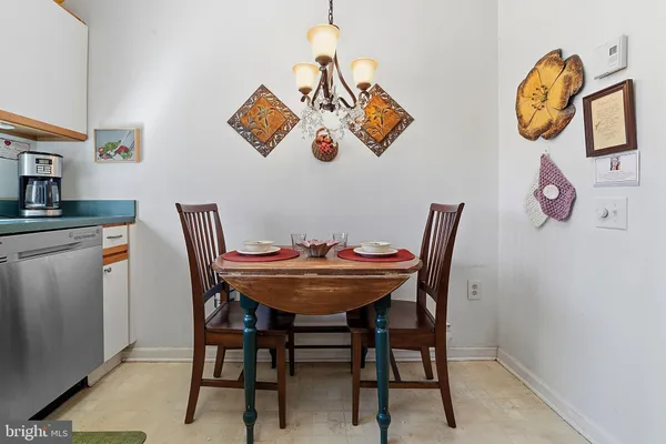 a view of a dining room and a table