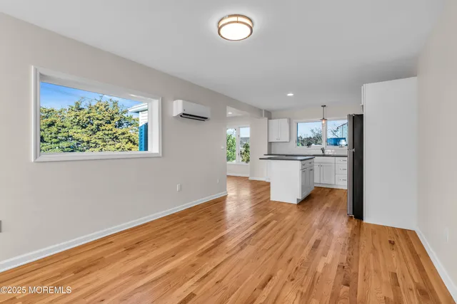a view of kitchen with wooden floor