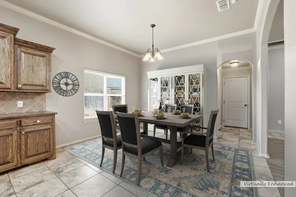 a view of a dining room with furniture
