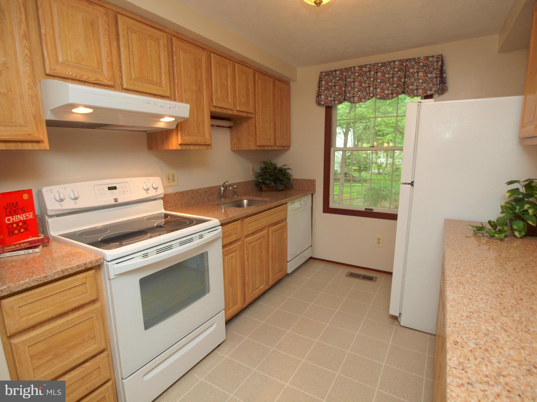 Kitchen w/Updated Cabinets and Granite Counters