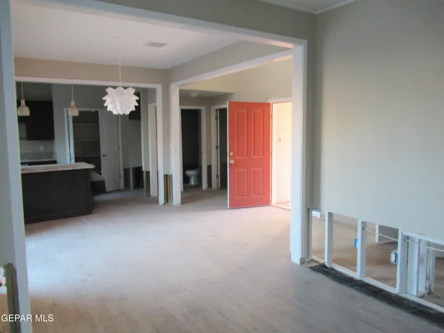 en empty room with windows