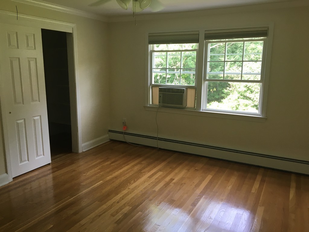 99 Parmenter Road Framingham, MA 01701 - Photo 17 of 30 a view of an empty room and window