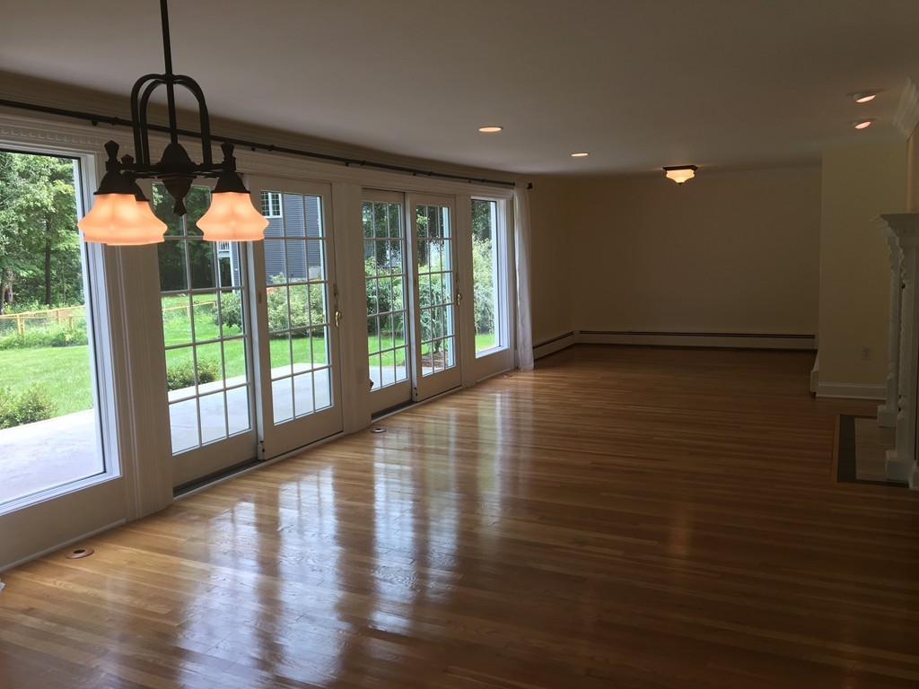 99 Parmenter Road Framingham, MA 01701 - Photo 9 of 30 a view of room with window and chandelier