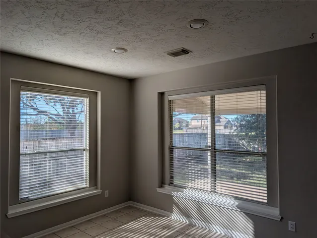a view of a livingroom with a balcony