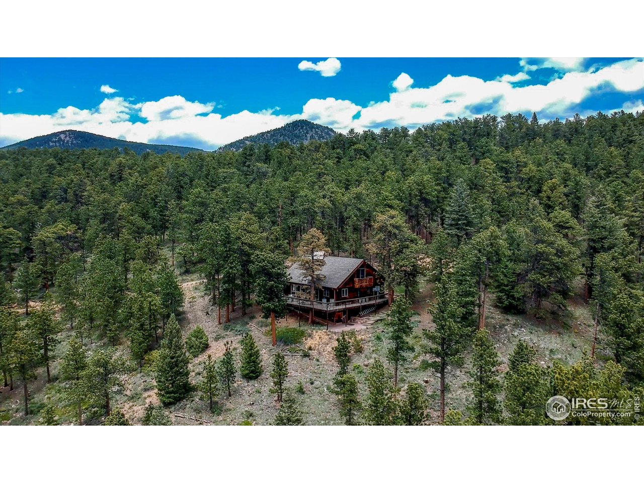 18673 Highway 7 Lyons, CO 80540 - Photo 2 of 39 Fawn Hill is an extremely rare large acre offering near Rocky Mountain National Park