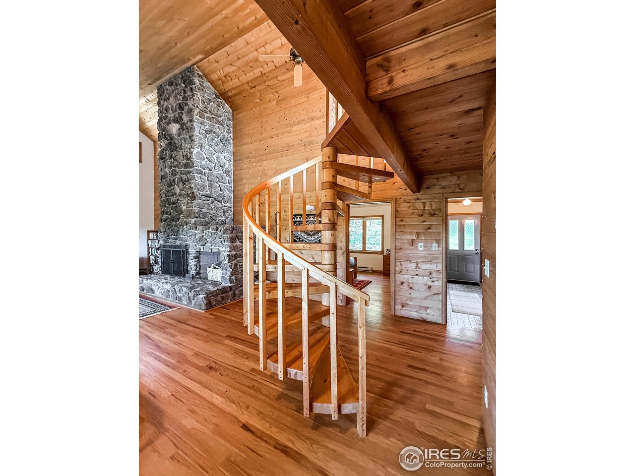 18673 Highway 7 Lyons, CO 80540 - Photo 26 of 39 The spiral staircase provides access to the loft/3rd bedroom