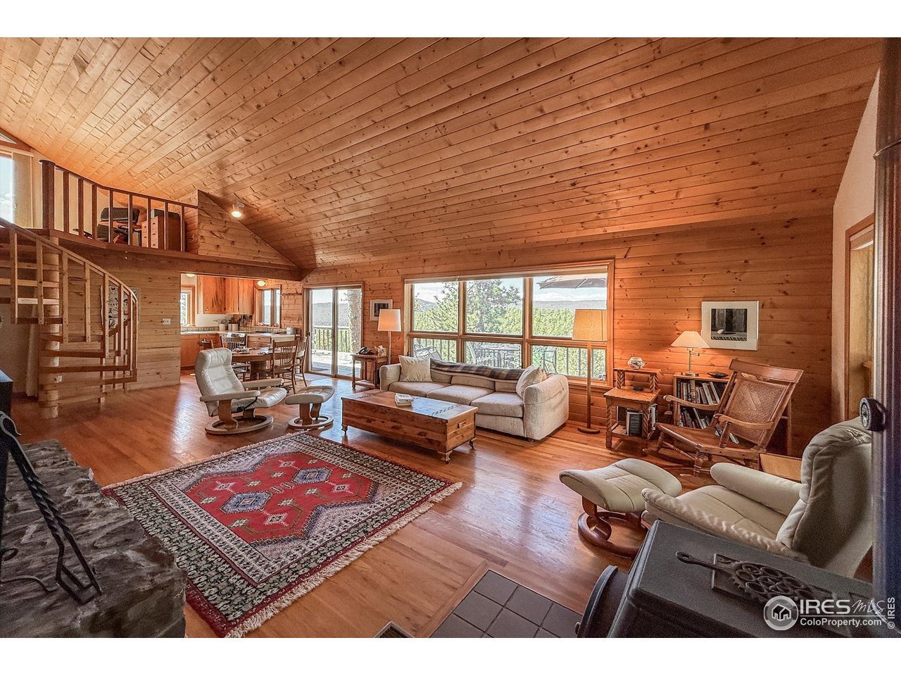 18673 Highway 7 Lyons, CO 80540 - Photo 7 of 39 Enjoy views from nearly every inch of the cabin, bringing the outdoor paradise in