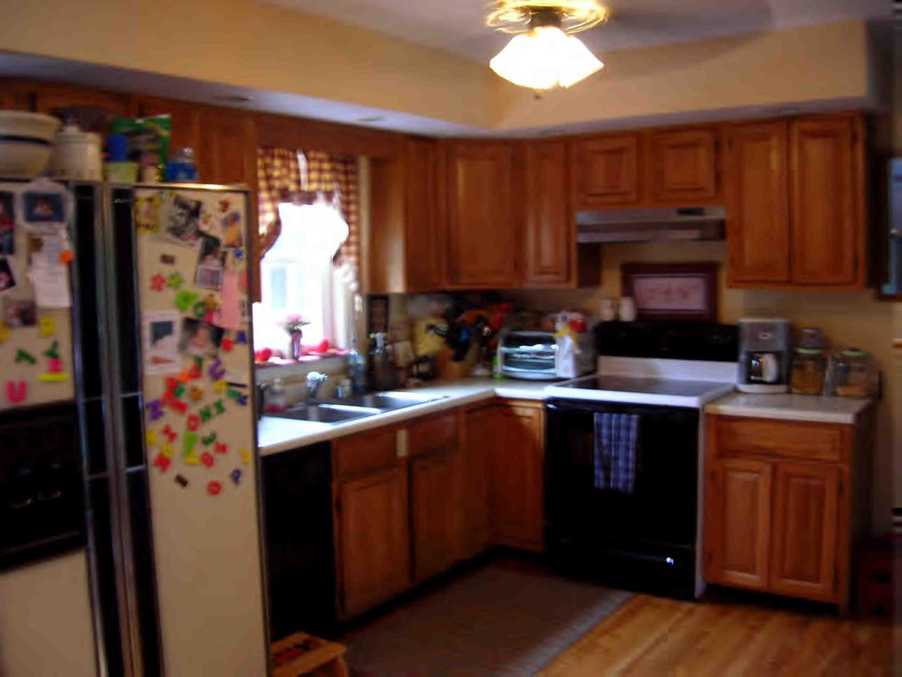 94 Morse Road Becket, MA 01223 - Photo 3 of 4 a kitchen with stainless steel appliances granite countertop a sink stove and refrigerator