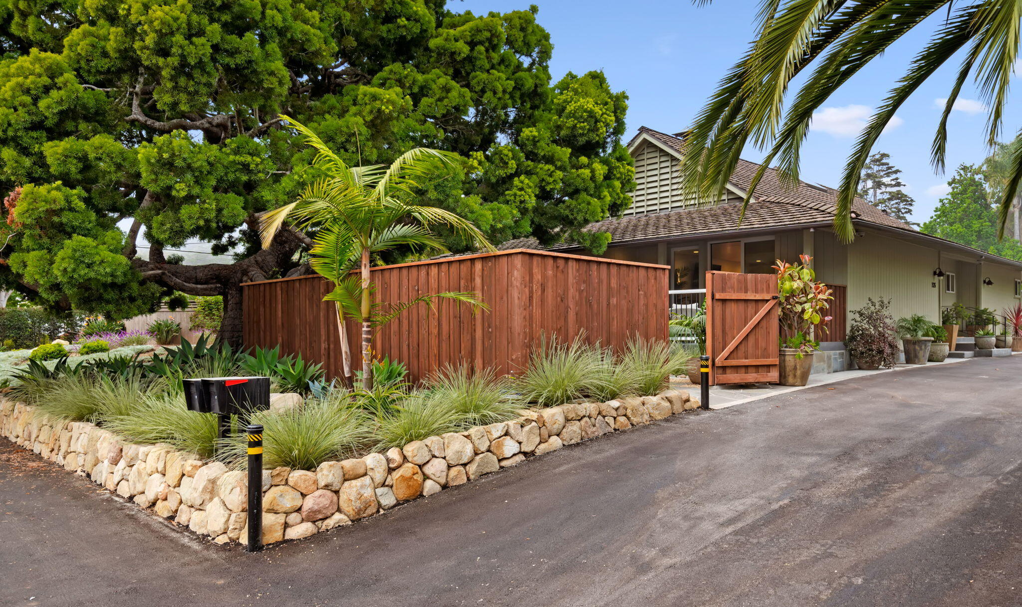 1126 Hill Road Montecito, CA 93108 - Photo 31 of 43 a view of a garden with a bench