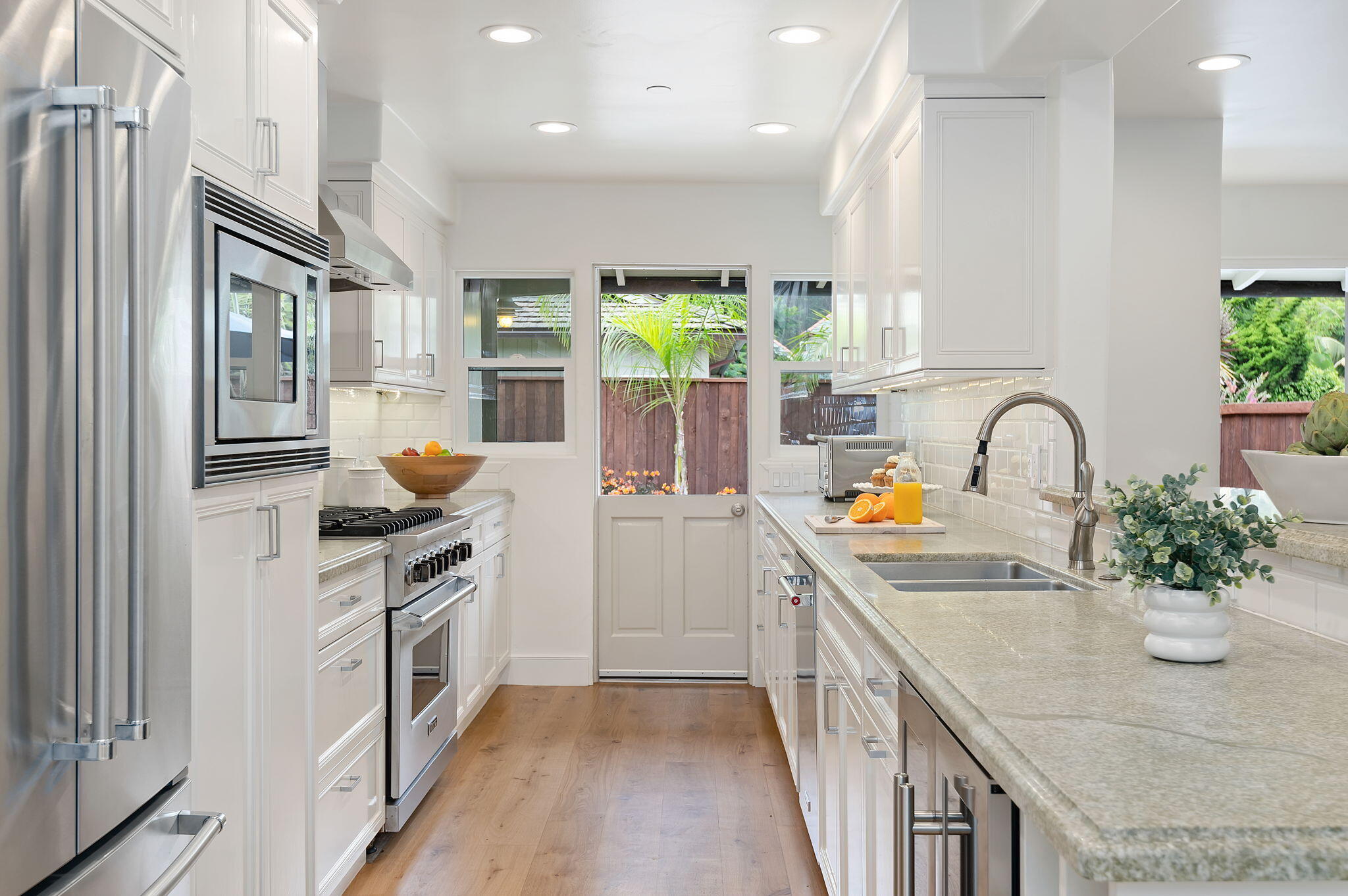 1126 Hill Road Montecito, CA 93108 - Photo 8 of 43 a kitchen with stainless steel appliances granite countertop a sink a stove and a refrigerator