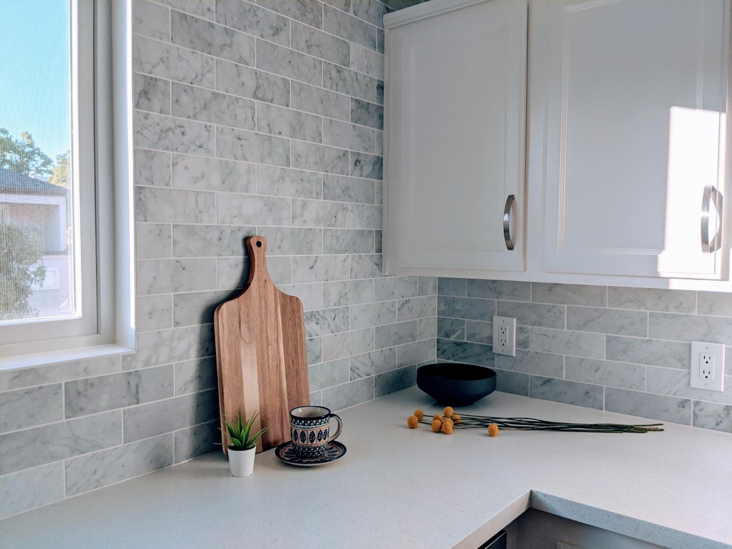 666 Encore Way San Jose, CA 95134 - Photo 13 of 41 a kitchen with a sink and a washing machine