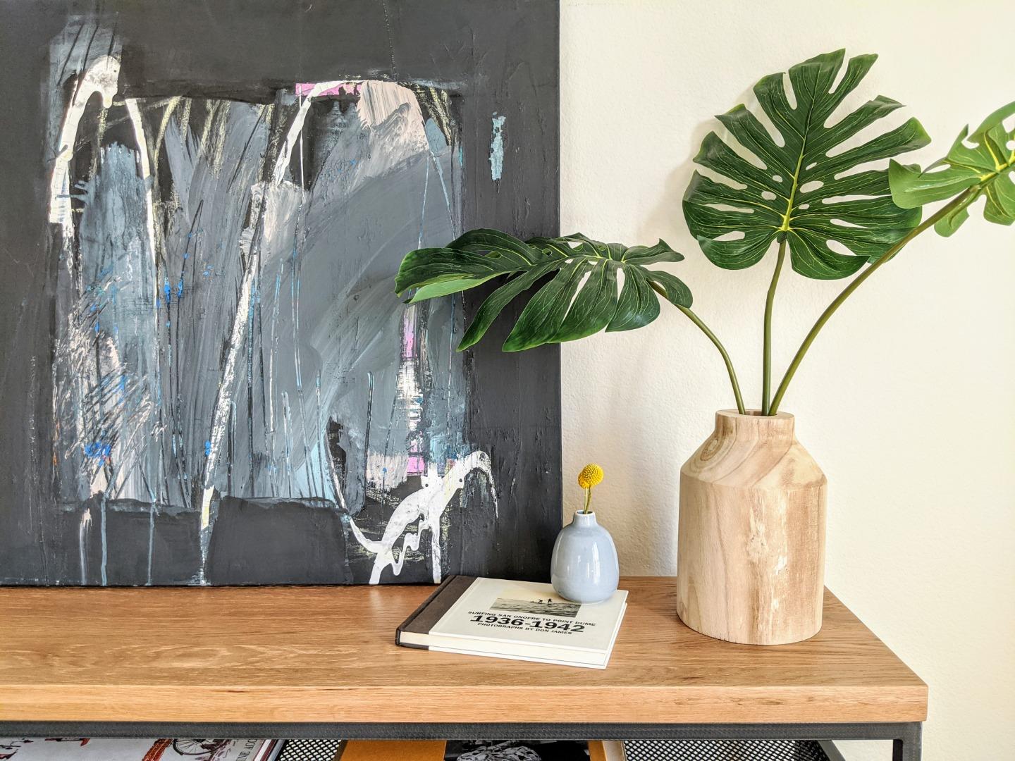 666 Encore Way San Jose, CA 95134 - Photo 2 of 41 a vase of flowers sitting on a table