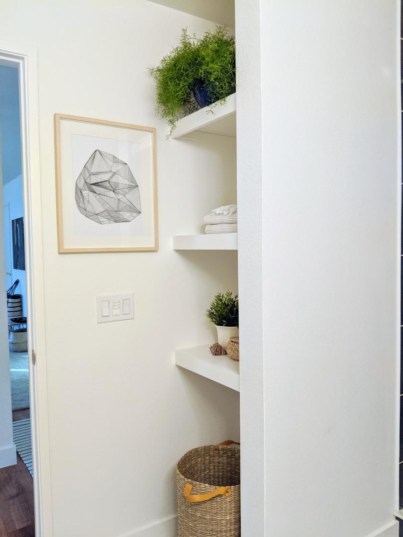 666 Encore Way San Jose, CA 95134 - Photo 24 of 41 a picture of a wall with a and a potted plant