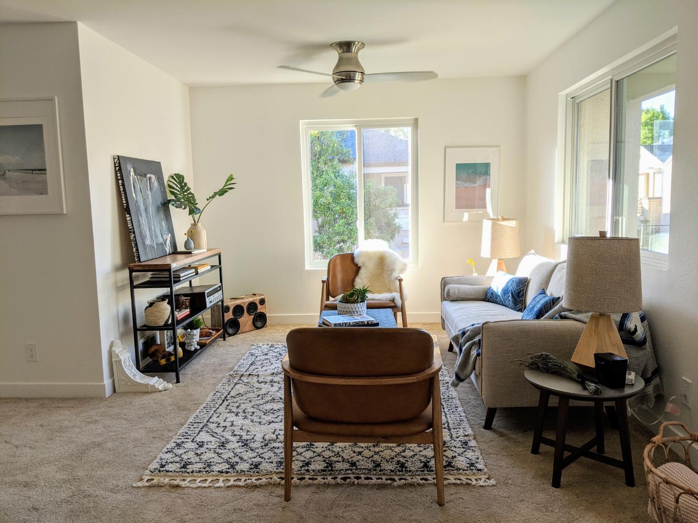 666 Encore Way San Jose, CA 95134 - Photo 5 of 41 a room with furniture and a window