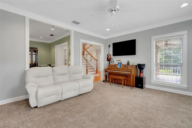 a view of a dining room with furniture window and outside view