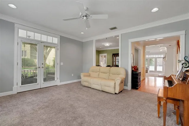 a kitchen with stainless steel appliances granite countertop a sink a stove and a wooden floors