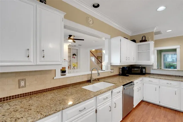 a room that has a window and wooden floor
