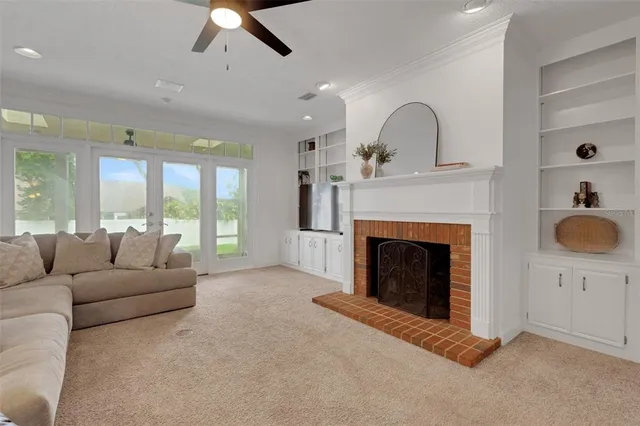 a balcony with wooden floor and fence