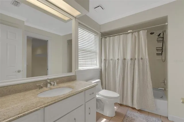 an aerial view of house with yard