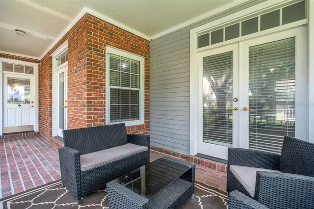 a view of a two chairs in the deck