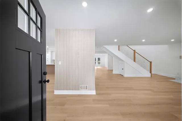 a view of a hallway with staircase