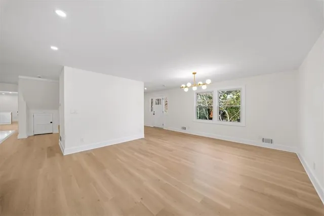 a kitchen with a sink stove and microwave
