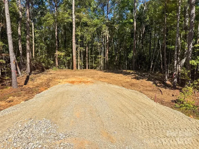 a view of a backyard of the house