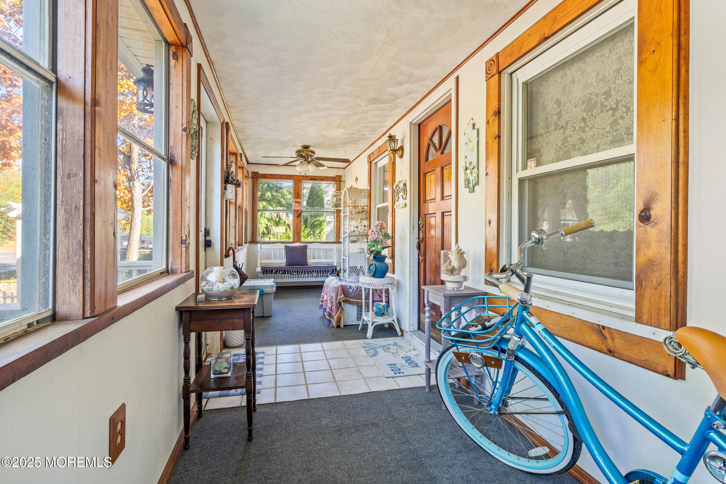 3020 Shafto Road Tinton Falls, NJ 07753 - Photo 13 of 42 a view of living room filled with furniture and a large window