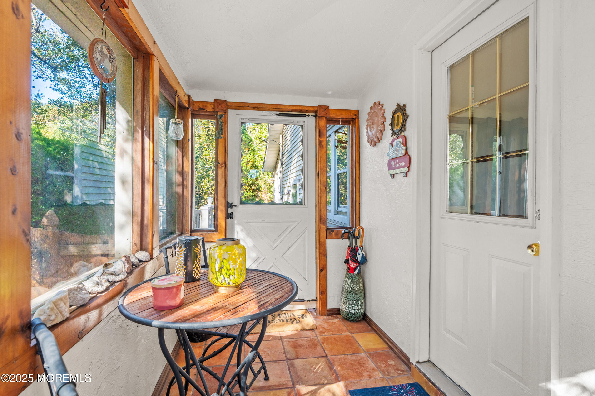 3020 Shafto Road Tinton Falls, NJ 07753 - Photo 14 of 42 a view of a dining room with furniture window and outside view