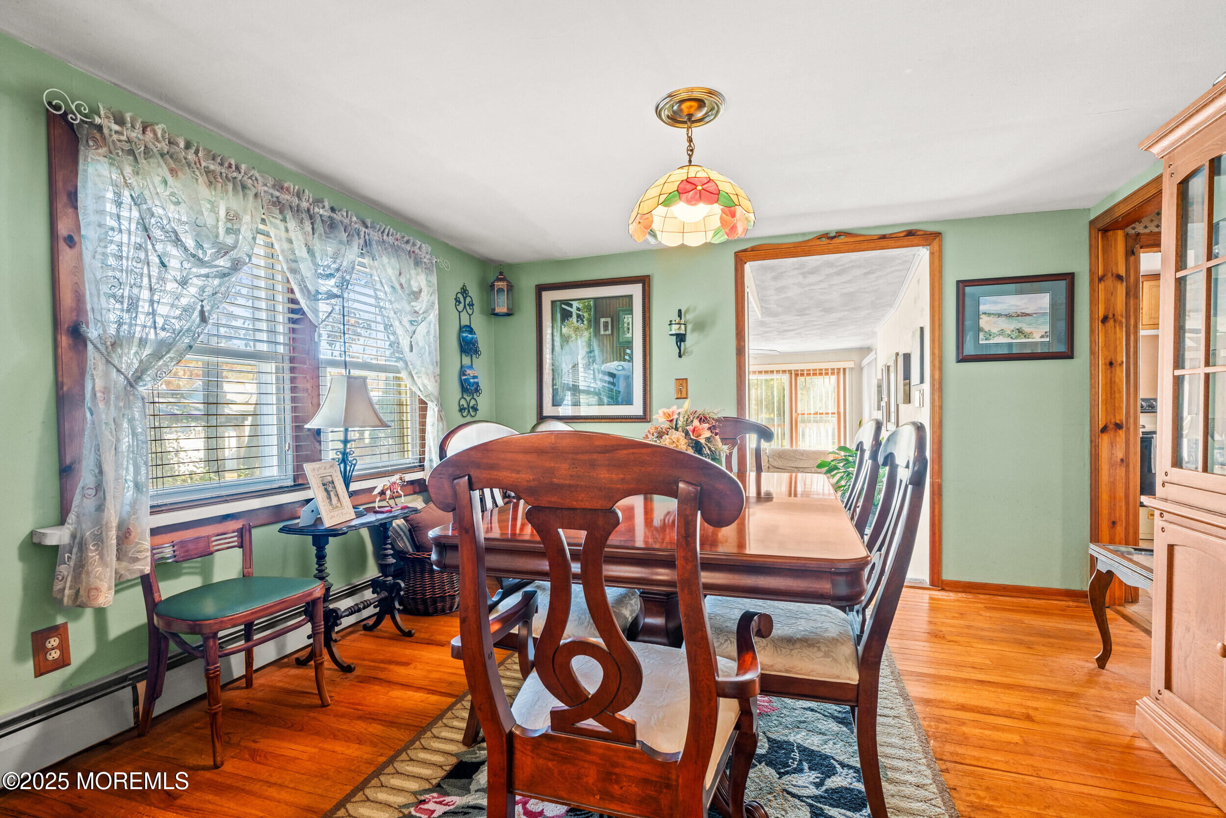 3020 Shafto Road Tinton Falls, NJ 07753 - Photo 28 of 42 a view of a dining room with furniture window and wooden floor