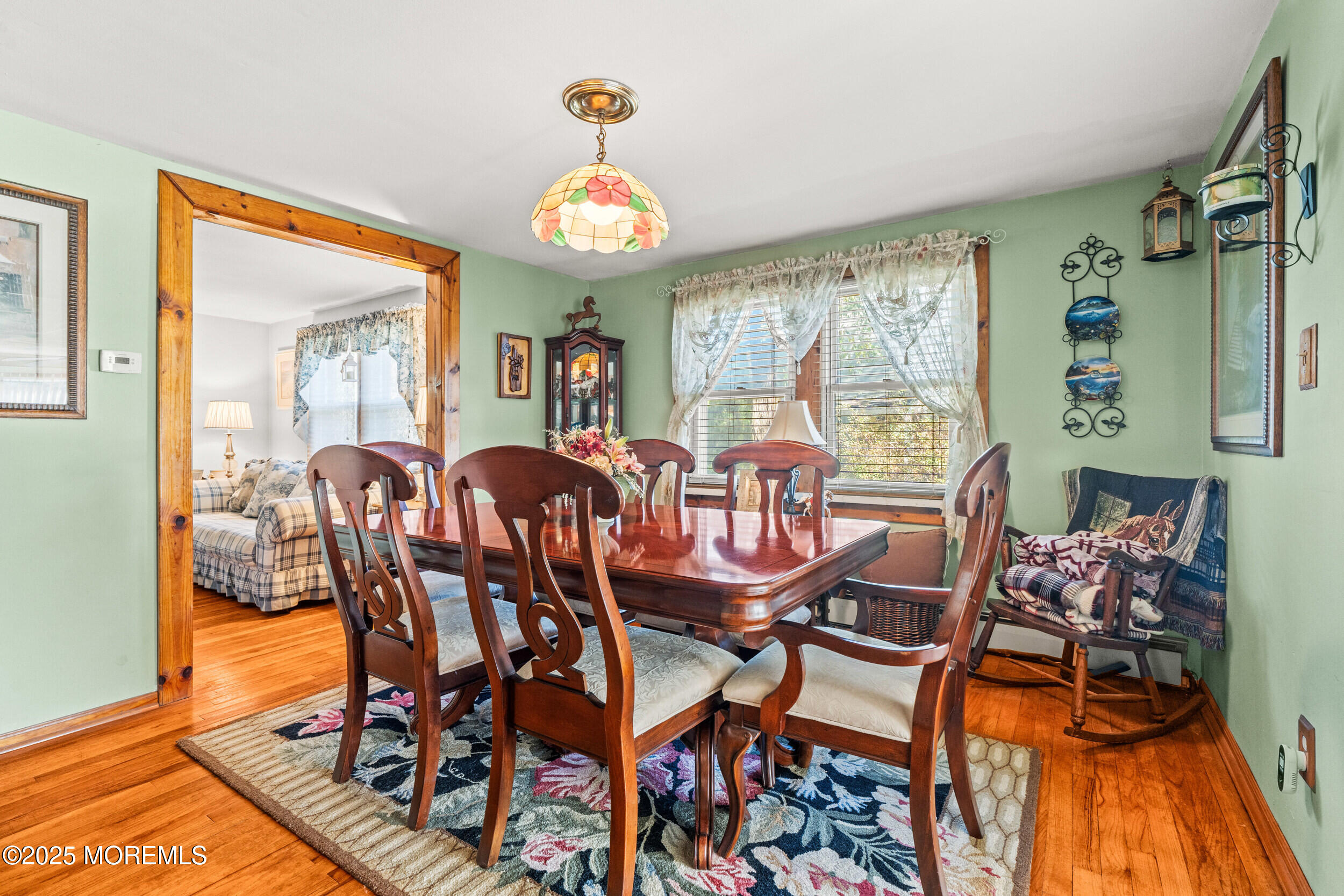 3020 Shafto Road Tinton Falls, NJ 07753 - Photo 3 of 42 a dining room with furniture and wooden floor