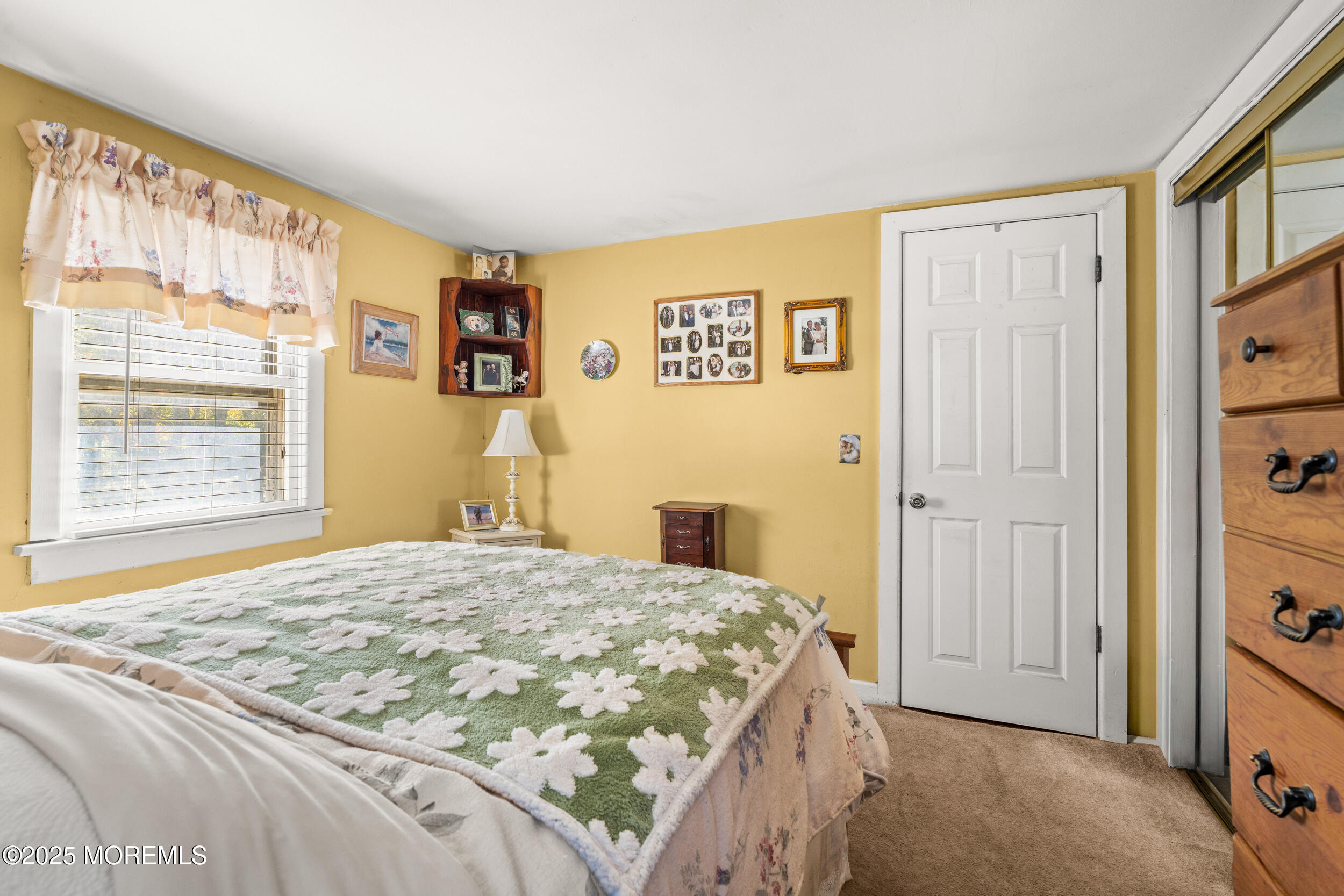 3020 Shafto Road Tinton Falls, NJ 07753 - Photo 36 of 42 a bedroom with a bed and a window