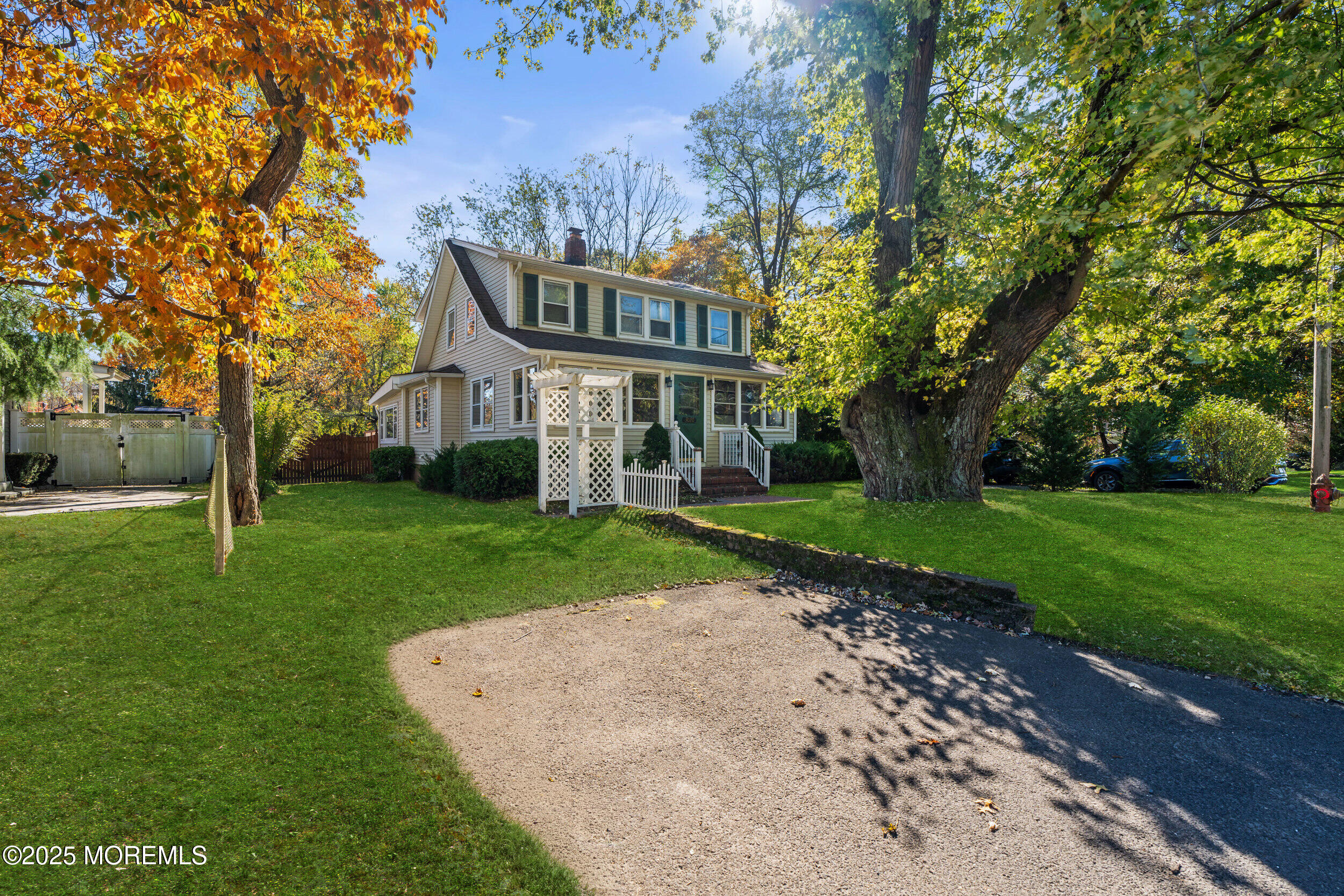 3020 Shafto Road Tinton Falls, NJ 07753 - Photo 39 of 42 a view of a house with a yard