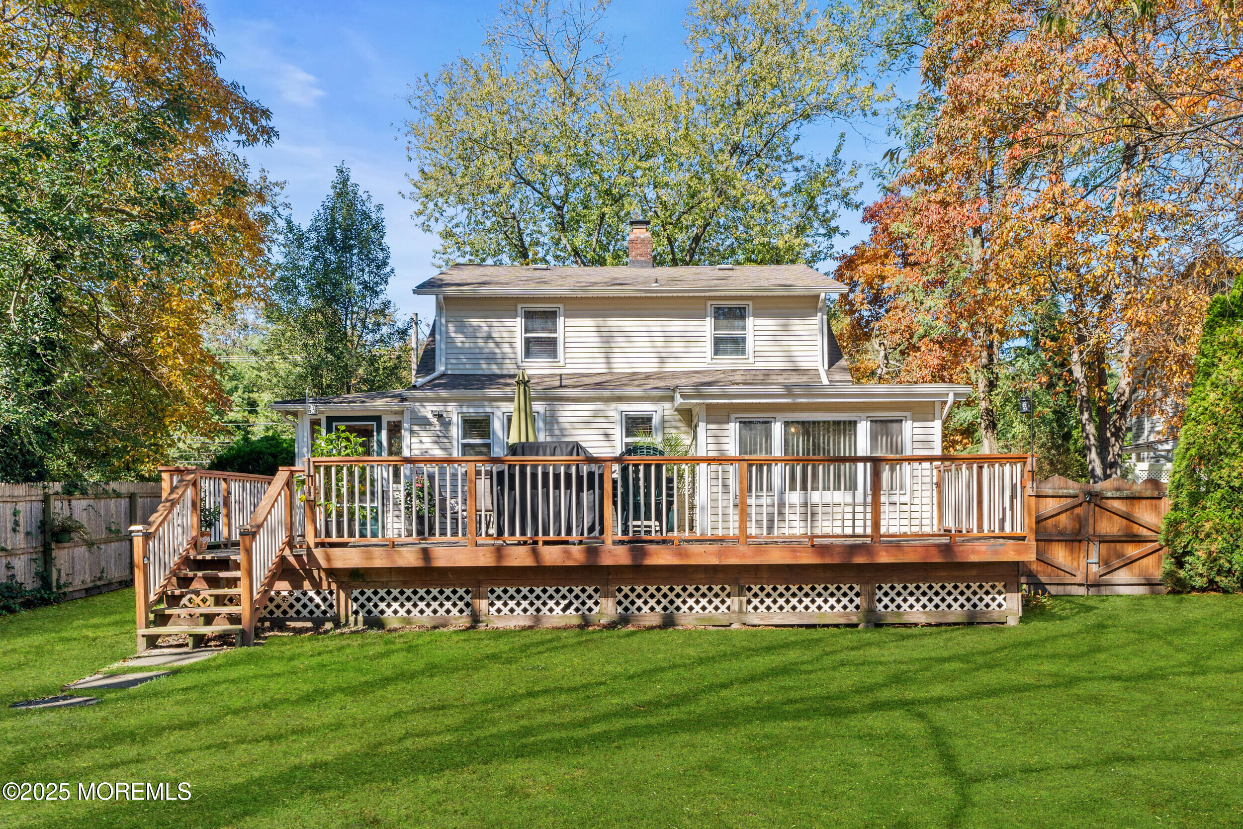 3020 Shafto Road Tinton Falls, NJ 07753 - Photo 41 of 42 a front view of a house with a garden